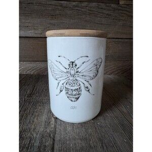 Creative Co-Op White Stoneware Jar With decorative bee and matching bamboo lid